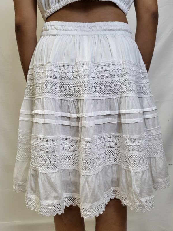 White medium length skirt, with a draw string wait line and lacey patterns - Image 2